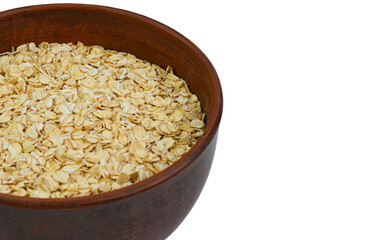 close up oatmeal porridge in a clay plate isolated on a white background