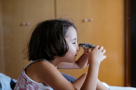 Kid And Hamster Becoming Friends.