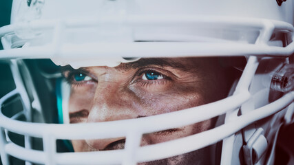 Strong and determined American football player wallpaper