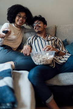 Couple Watching Television at Home