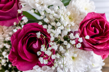 Bouquet of flowers Pink roses and white chrysanthemums