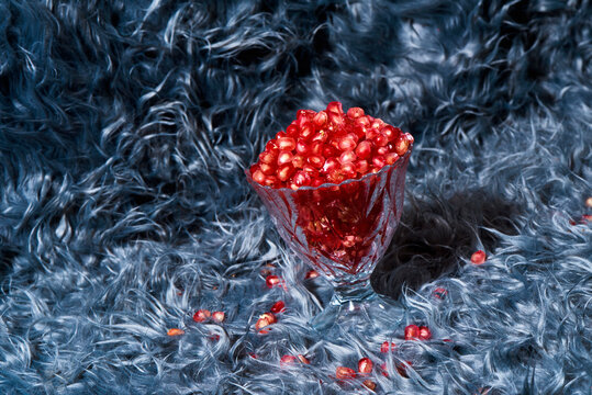 pomegranate seeds in a glass