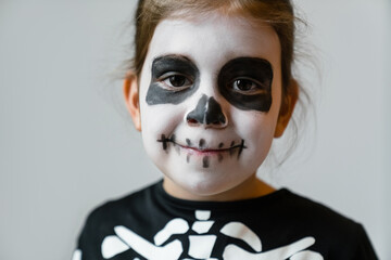 Happy little skeleton smiling for camera