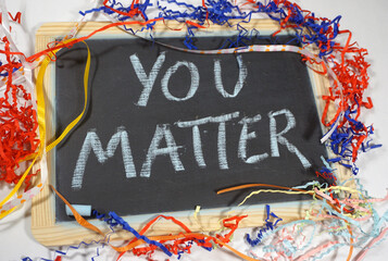 You matter celebration message on chalkboard