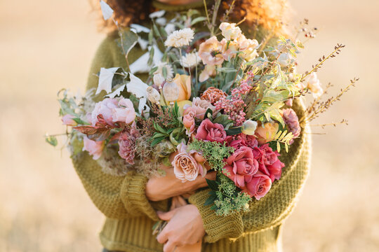 Woman holding bouquet