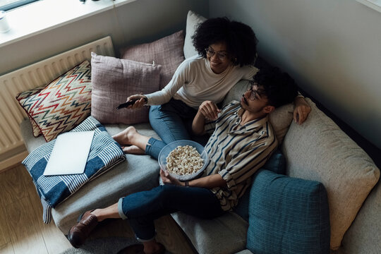 Couple Watching Television at Home