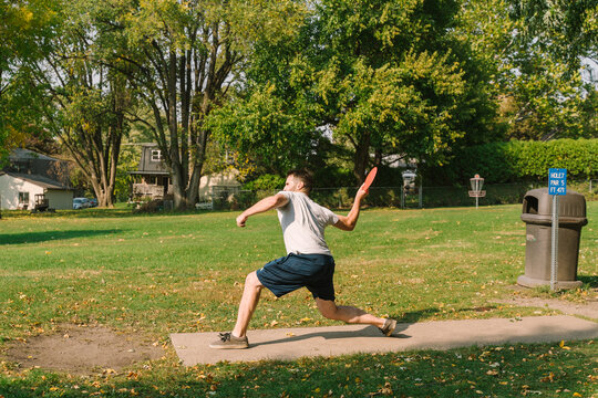 a man playing disc golf