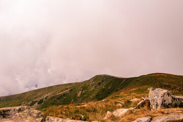 At the top of the mountain Gutyn Tomnatyk, the view from the mountain on the Montenegrin overcast...