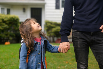 Happy child holding hand