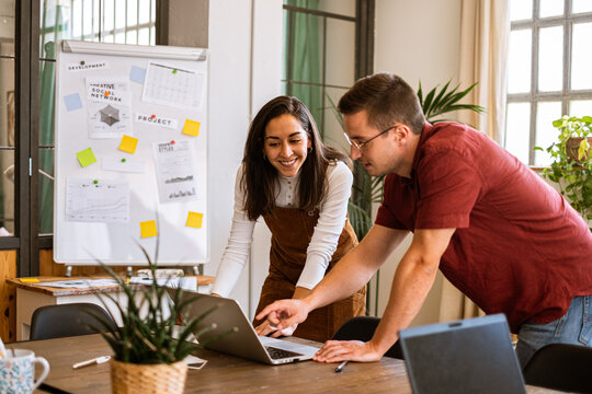 Young business people preparing a presentation in the office