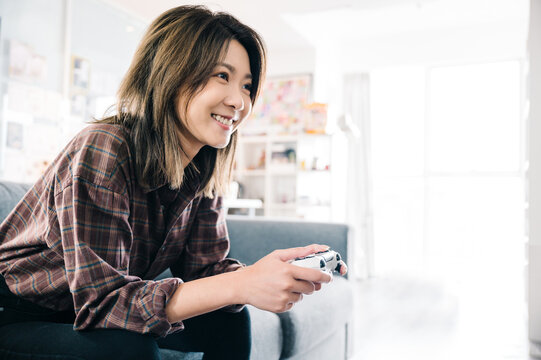 Young woman playing video games