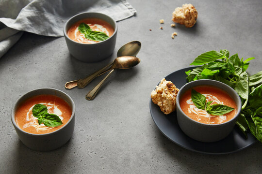 Three Bowls of Tomato Basil Bisque Soup