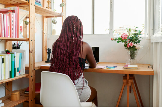 Student studying in her dorm room