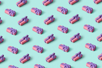 Pattern of christmas gifts handmade from modeling clay.
