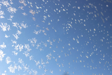 Frosty pattern on the window glass with copy space.