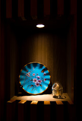 Blue flower ceramic plate in the spotlight