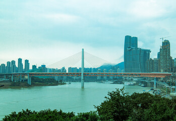 Fototapeta na wymiar A bridge across the Jialing River in Chongqing