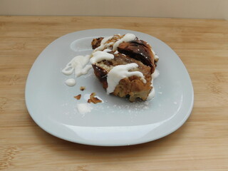 a piece of homemade apple strudel on a plate.