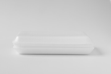 New white foam box for food on natural background.