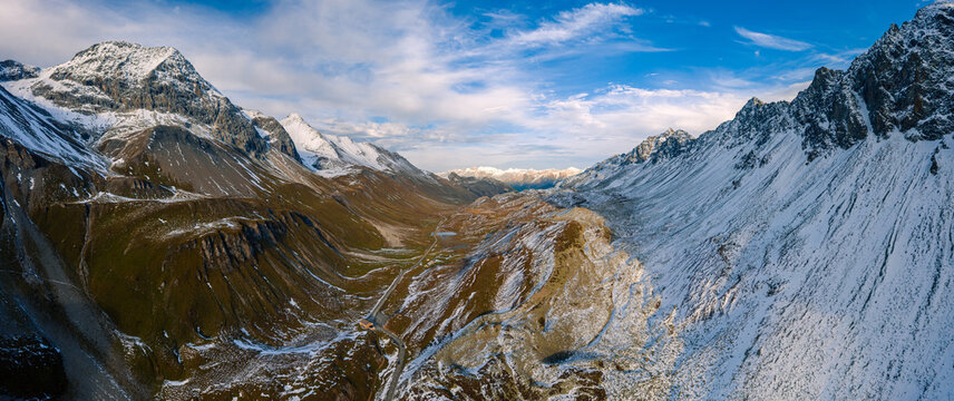 Massive alpine valley road panorama