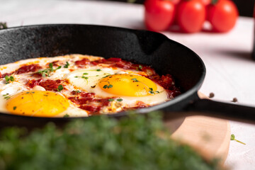 Traditional israel food eggs with tomatoes shakshouka in a pan