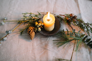 Candle on the christmas table