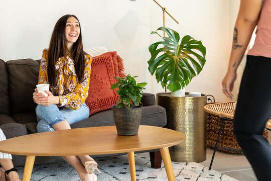 Women Smiles At Coworker