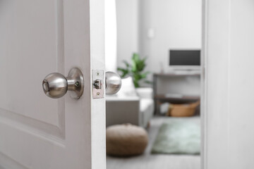 View of living room through open door