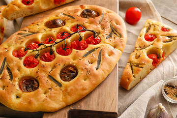 Traditional Italian focaccia on board, closeup