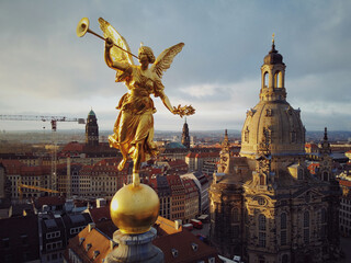 A golden statue greets the sunrise in Dresden