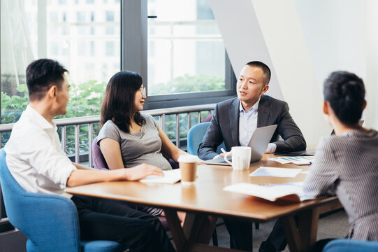 Asian people working in office