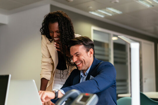 Businessman with assistant working in office