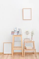 Interior of modern room with shelf units and books