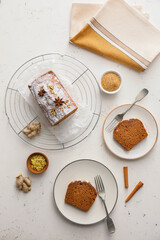 Composition with tasty gingerbread cake on light background