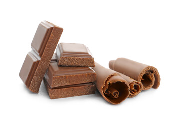 Delicious chocolate pieces and curls on white background
