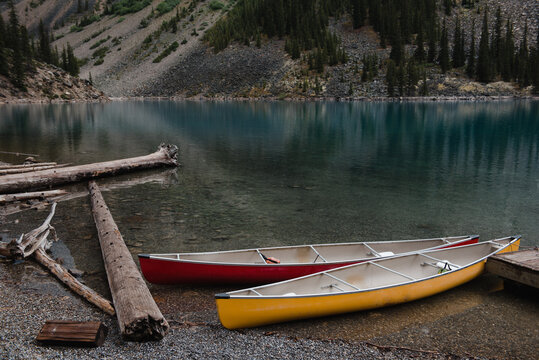 Canoes on mountain lake