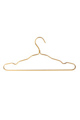 Subject shot of golden metal clothes hanger with horizontal bar for pants and cut notches for keeping thin straps in place. Ultra thin and strong coat hanger is isolated on the white background.