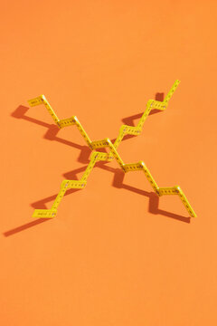 Measuring meters on orange background.