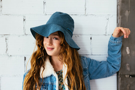 Redhead hipster teen girl in stylish outfit