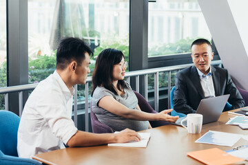 Asian people working in office