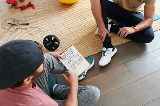 Friends discussing their workout schedule