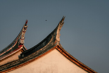rooftop of the ancient Chinese village buildings, an traditional village with neat rows of houses...