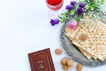 Pesah celebration concept (jewish Passover holiday). Traditional book with text in hebrew: Passover Haggadah (Passover Tale)