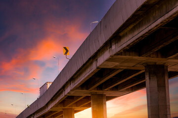 Bottom view of elevated concrete highway. Overpass concrete road. Road flyover structure. Motorway...