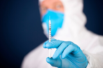 Herd immunity in community, doctor with vaccine.