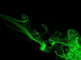 Fototapeta premium Abstract green smoke on black background, darkness concept