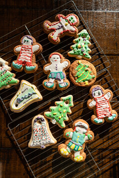 Decorated Sugar and gingerbread cookies in Christmas shapes.