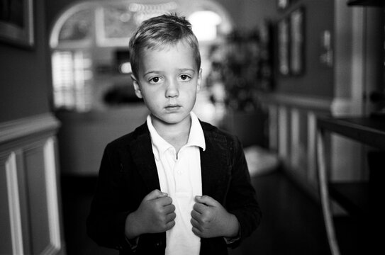 Handsome young boy wearing a blazer