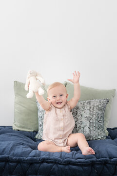 Happy Baby With Arms Up