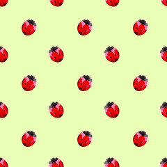 Cute seamless pattern with red ladybugs on green background